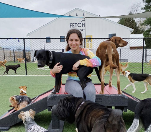 Hugging a dog in daycare